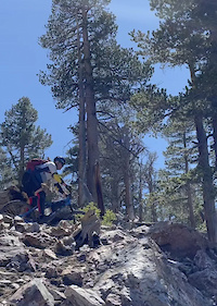 Alex Riding a technical switchback on...